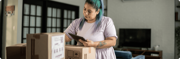 Person with blue hair making a workback schedule for packing for a move