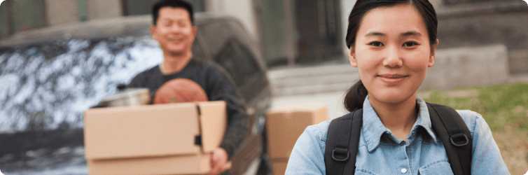 Father helping his daughter move for college